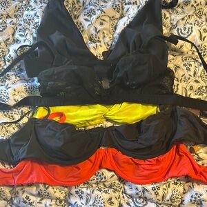 SKIMS Elegant Black, Yellow, and Red Lace Bras